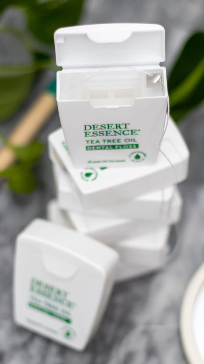 Desert Essence Tea Tree Oil Dental Floss - 50 Yards, Beeswax-Coated, Thick No-Shred Tape